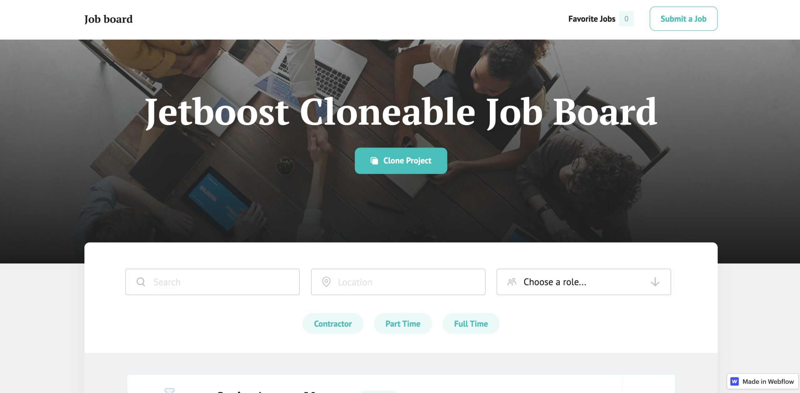 Screenshot of Jetboost cloneable job board. Background photo is an overhead shot of 5 people working at a table with laptops.
