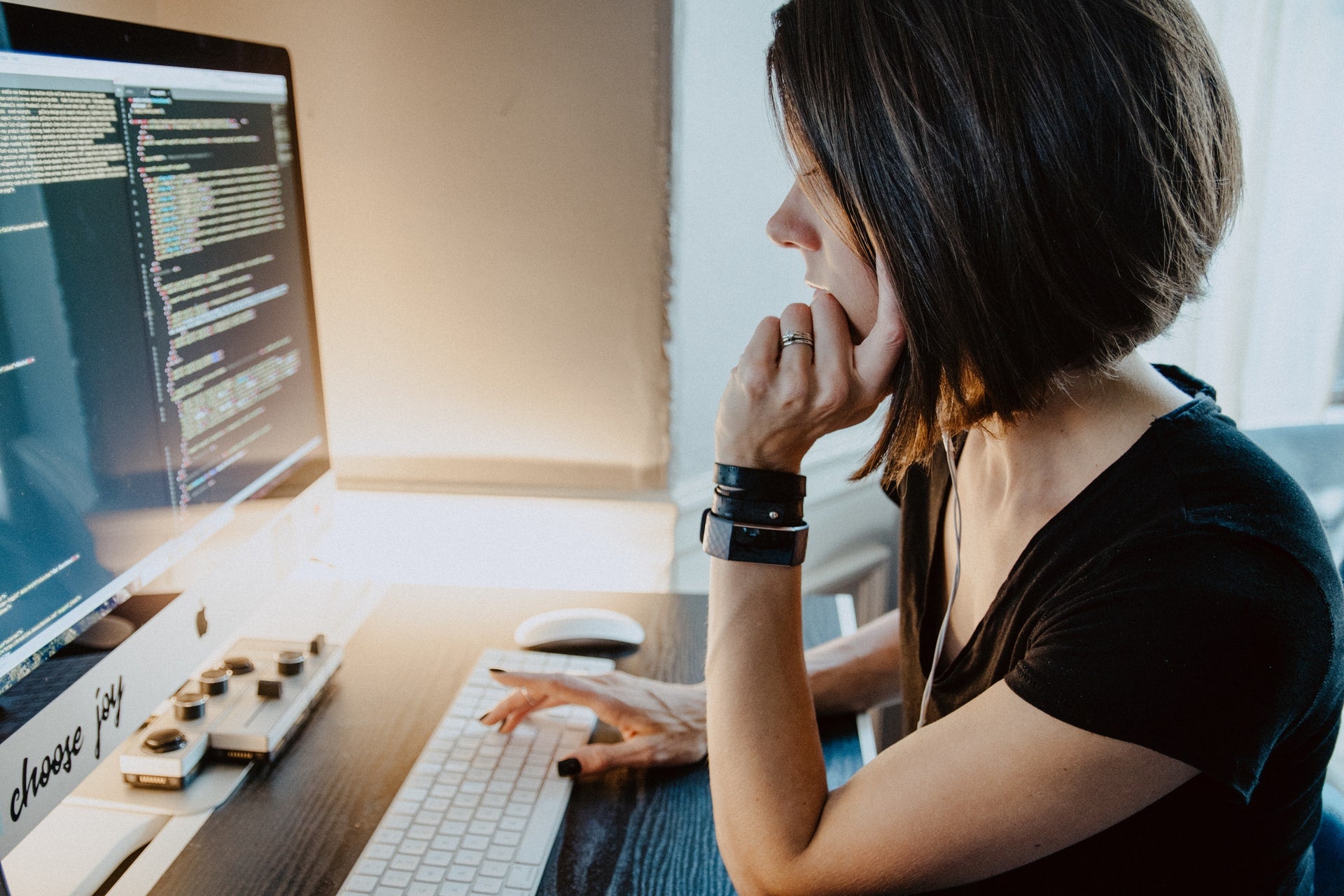 A woman at a computer registering a business