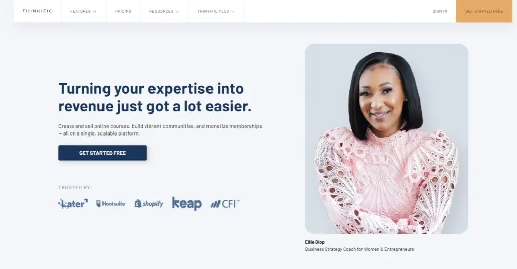 A screenshot from Thinkific's website with a black woman on the right, some logos of training academies, and a tag line for Turning your expertise into revenue just got a lot easier.