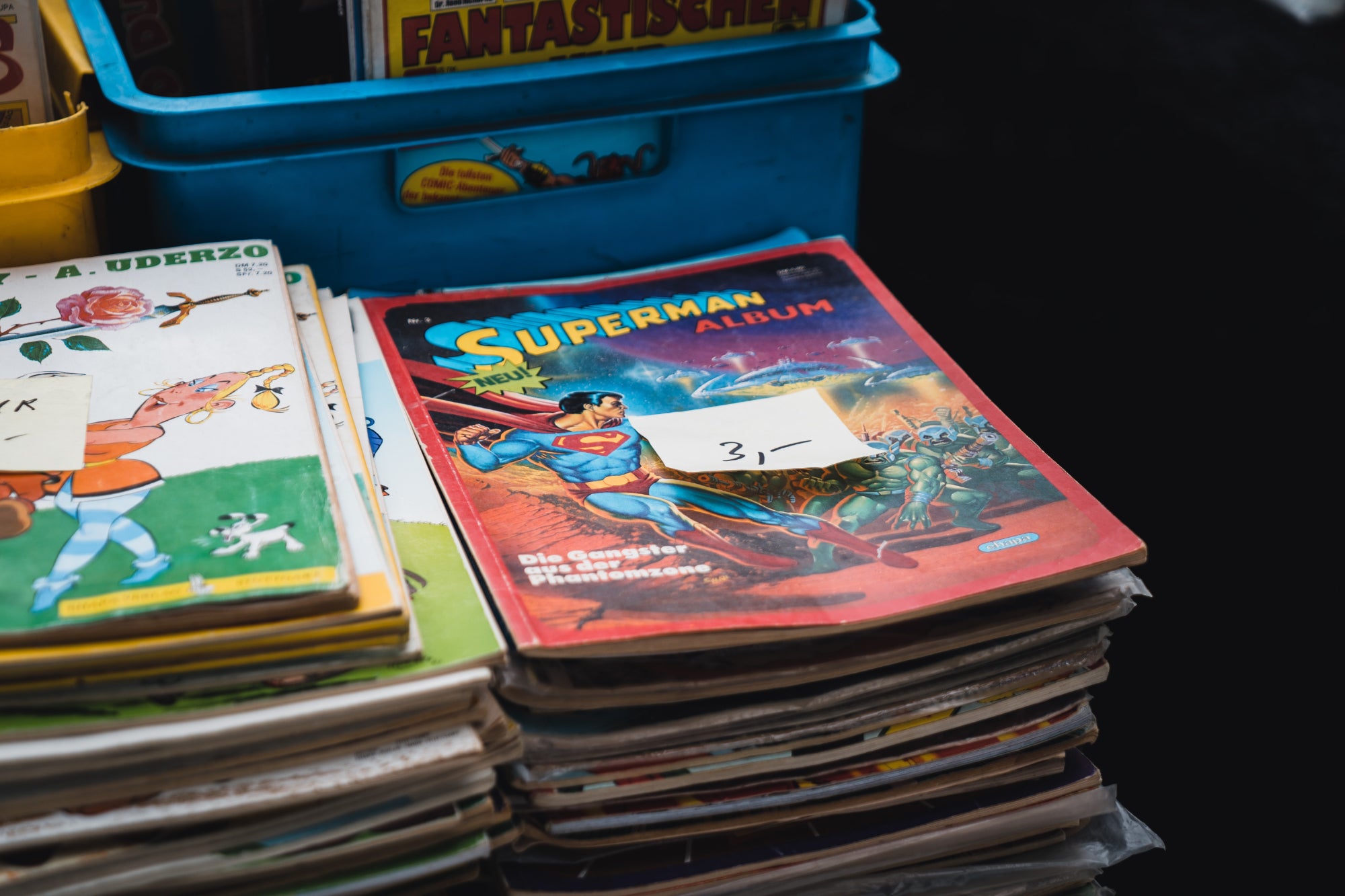 Stacks of used comic books for sale