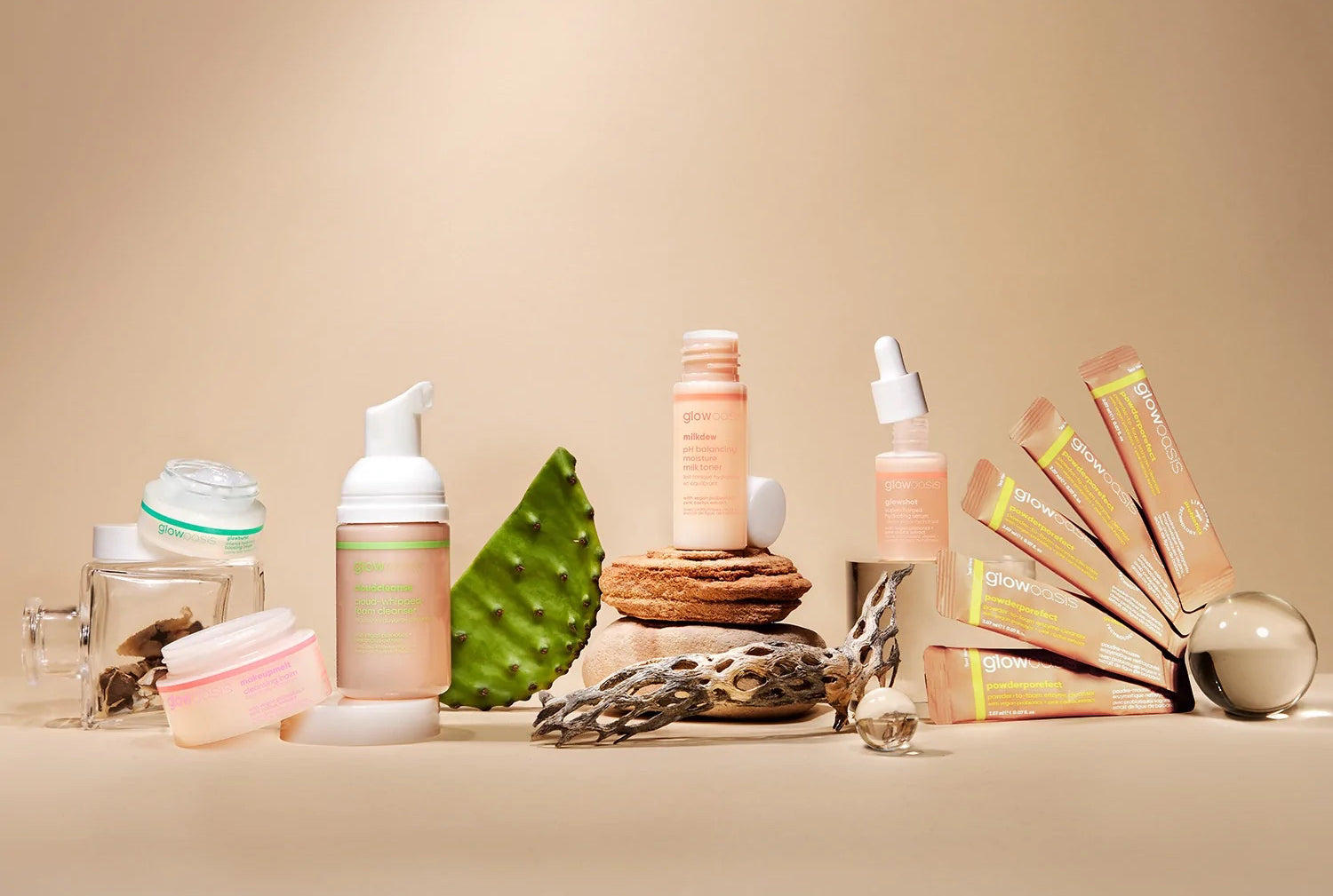 An array of skin creams and serums by the skin care line Glow Oasis