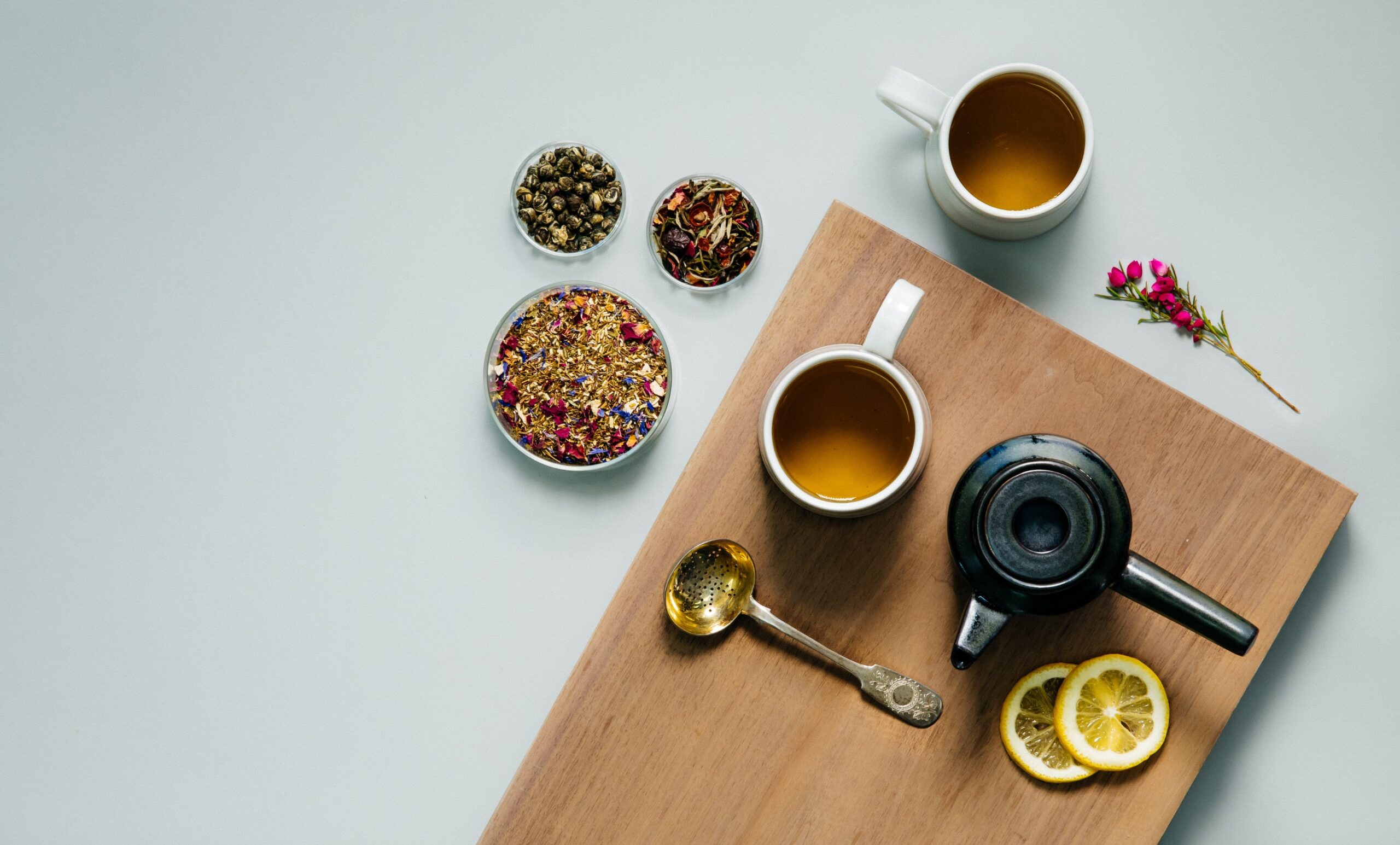 art of tea blends pictured next the teaware.