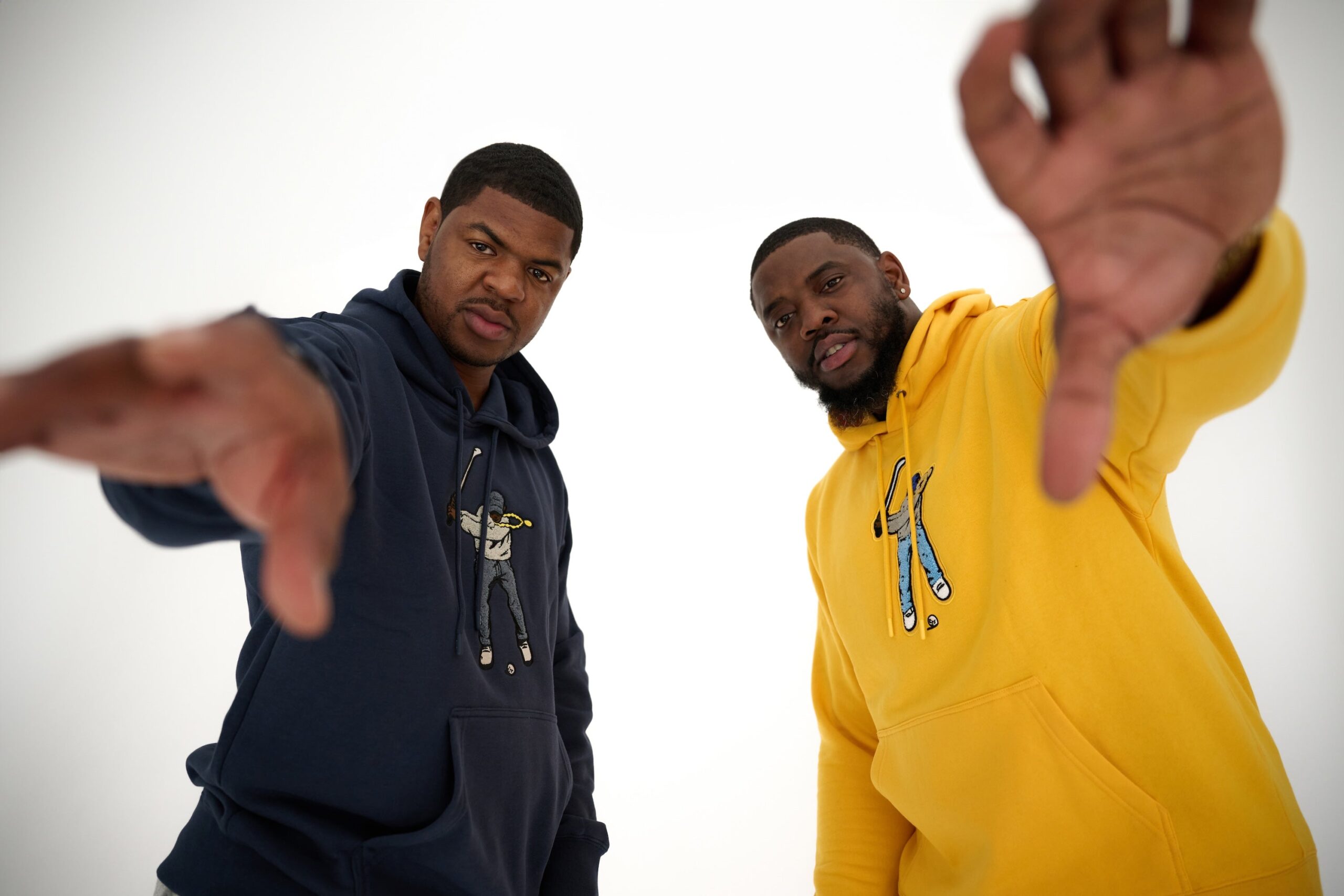 Founders of Eastside Golf Olajuwon Ajanuku (right) and Earl Cooper (left) in a studio.