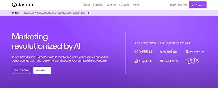 Screenshot of the Jasper website promoting AI-driven marketing solutions with options to start for free or get a demo. Several company logos are shown, indicating partnerships or endorsements.