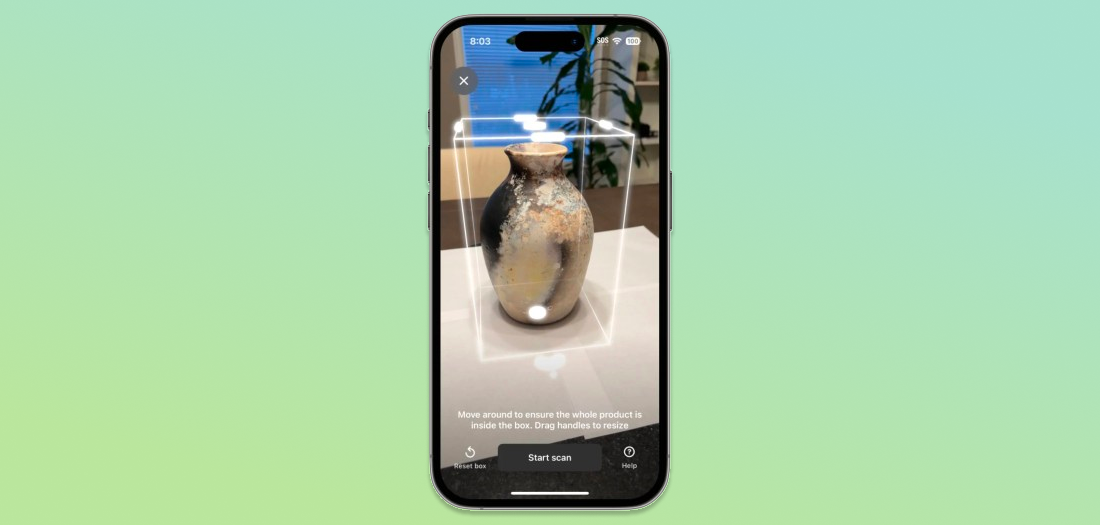 Shopify mobile AR app scanning a vase for product modeling.