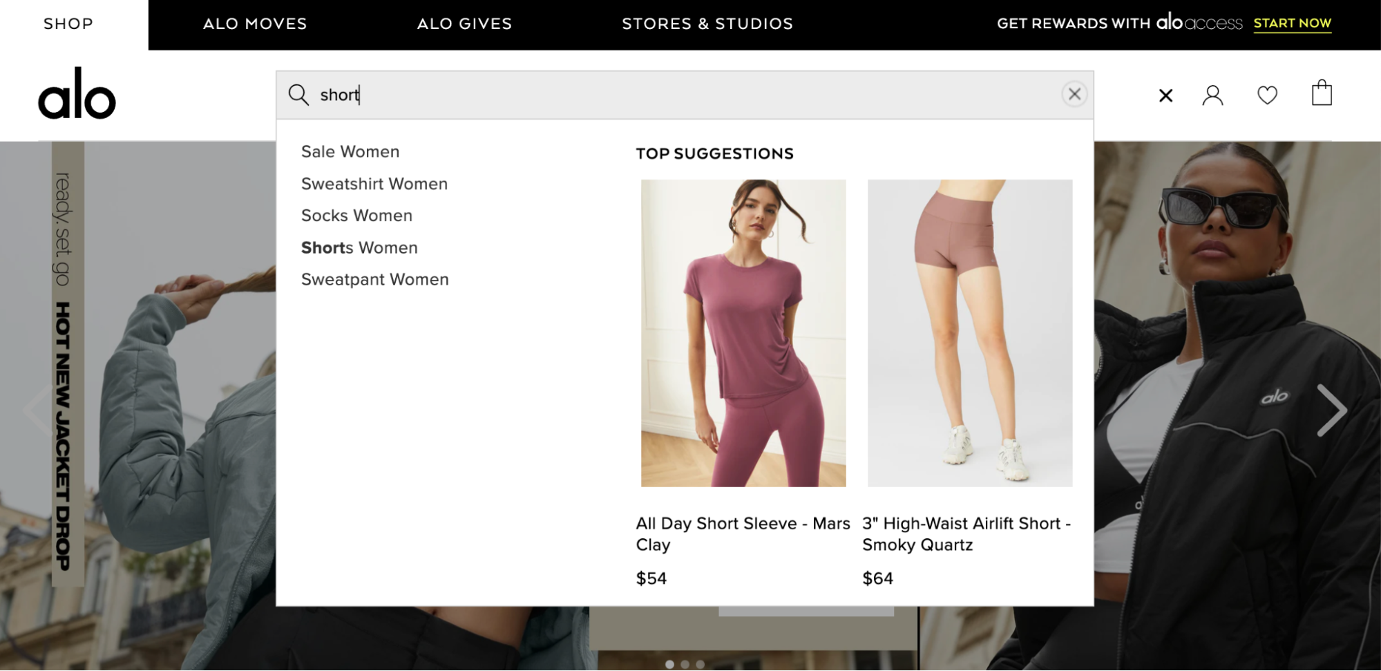 Alo Yoga website with search suggestions for “shorts.”