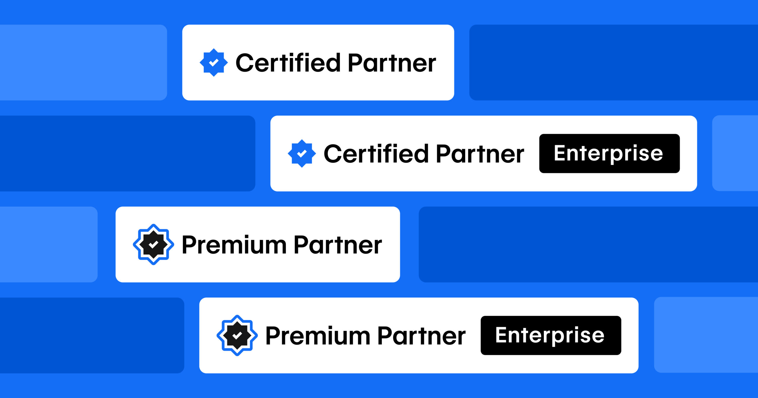 A collection of four new Webflow Partner Program badges, each symbolizing a different type of partner, showcasing new Enterprise Distinctions.