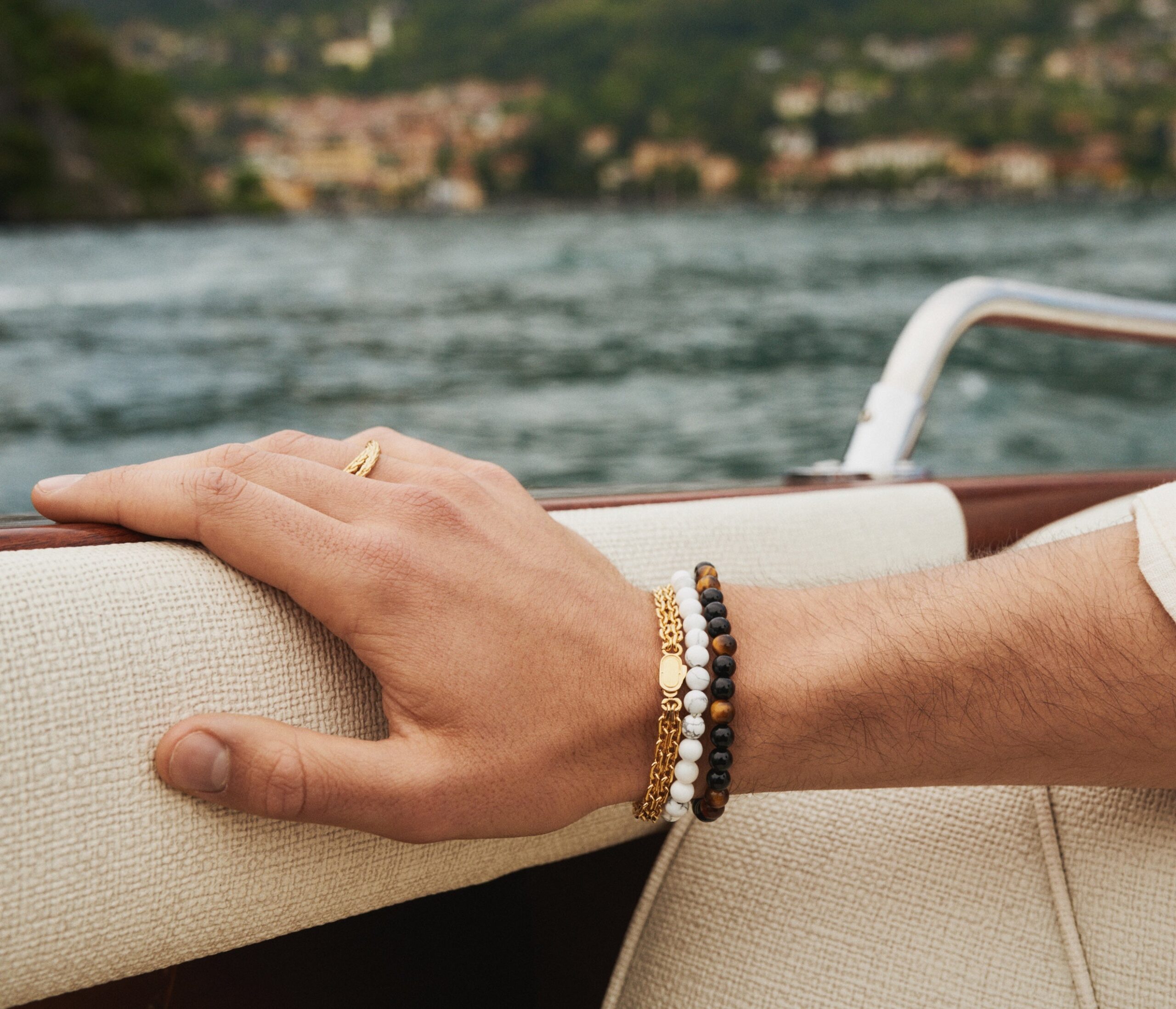 a craftd london bracelet stack and ring on a model’s hand.