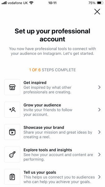 Instagram’s checklist of profile setup tasks with arrows for more information about each task.