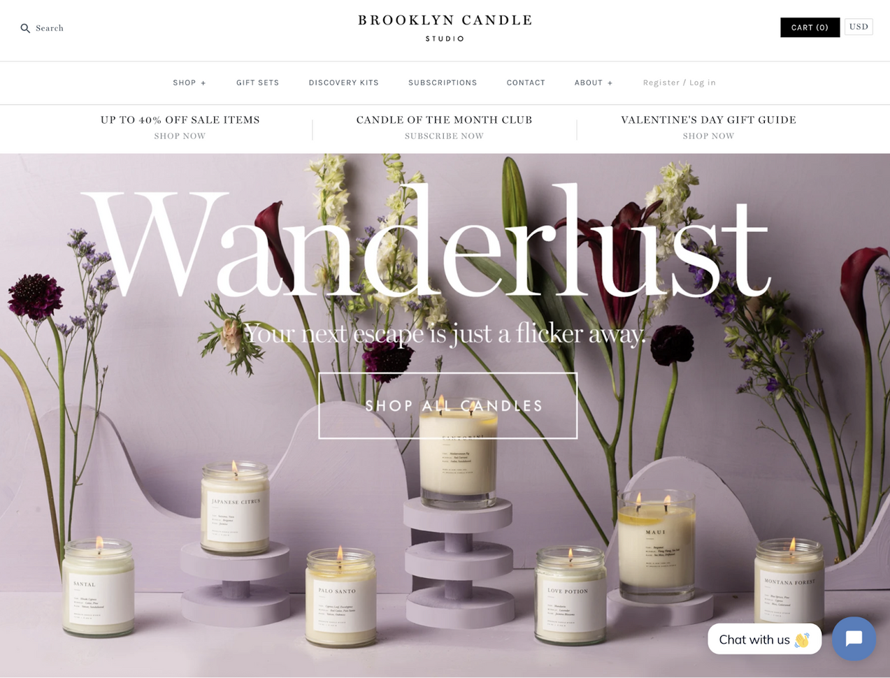 Brooklyn candle studio homepage shows various candles and flowers arranged together.