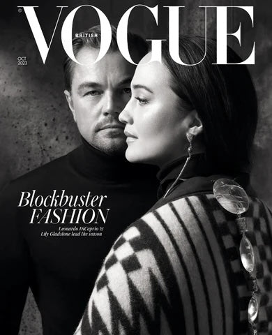 Lily Gladstone (Blackfeet) and Leonardo DiCaprio on the cover of British Vogue for October 2023; photograph by Craig McDean; photo courtesy British Vogue; Lily is wearing the Coast Salish Pattern Wool Blanket designed by Louie Gong (Nooksack)