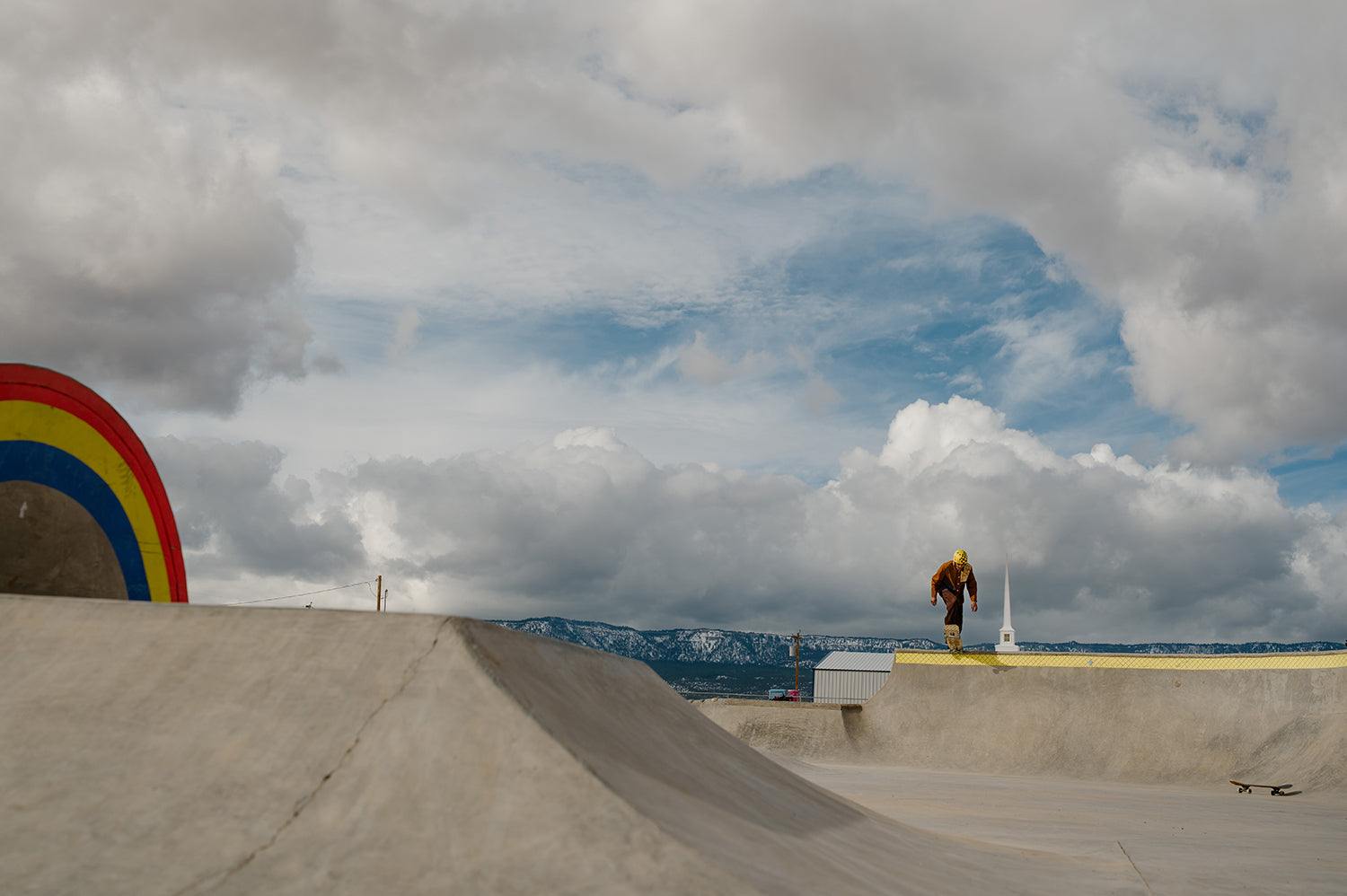 A man drops onto a ramp at the skate park in Navajo Nation