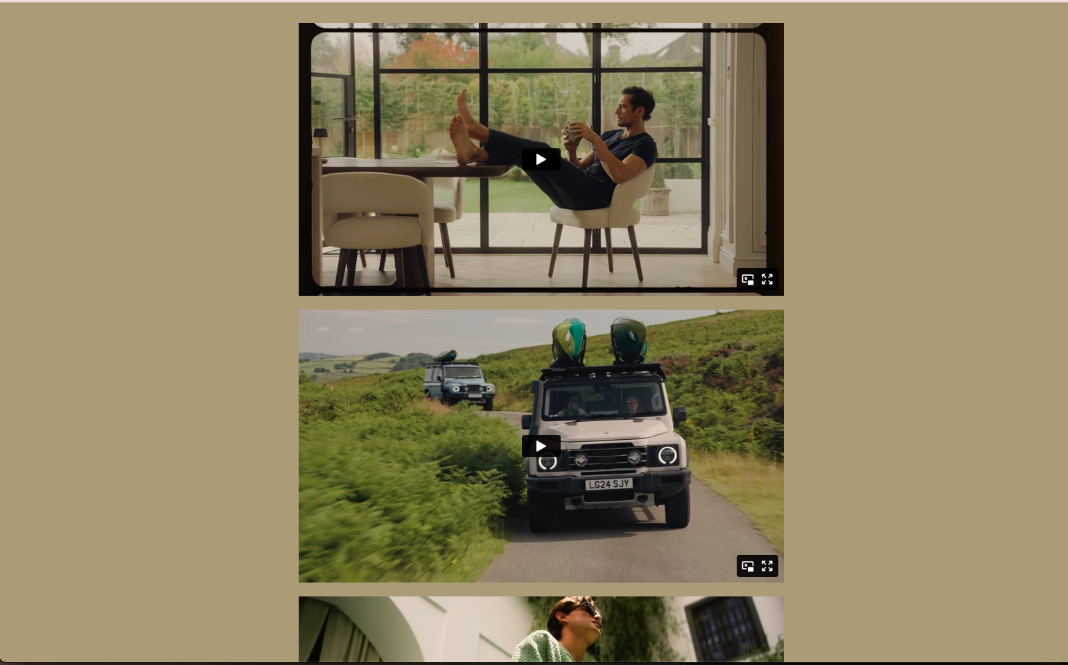 Portfolio showcase of video content featuring three video thumbnails. The top video shows a person relaxing in a modern chair with feet up, holding a phone, beside large glass windows overlooking a garden. The middle video displays two off-road vehicles driving through green countryside, with what appears to be kayaks or surfboards mounted on the roof of the white SUV in the foreground. The bottom video is partially visible, showing what looks like a person in a green outfit. All thumbnails have play buttons and expand options.
