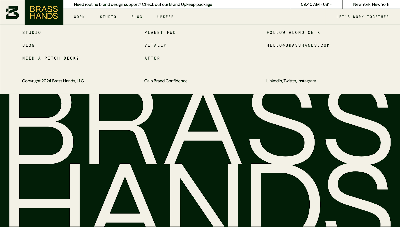 A screenshot of Brass Hands’ website footer in a two-tone display, with the top half in a cream color and the bottom half in green with oversized “BRASS HANDS” text branding.