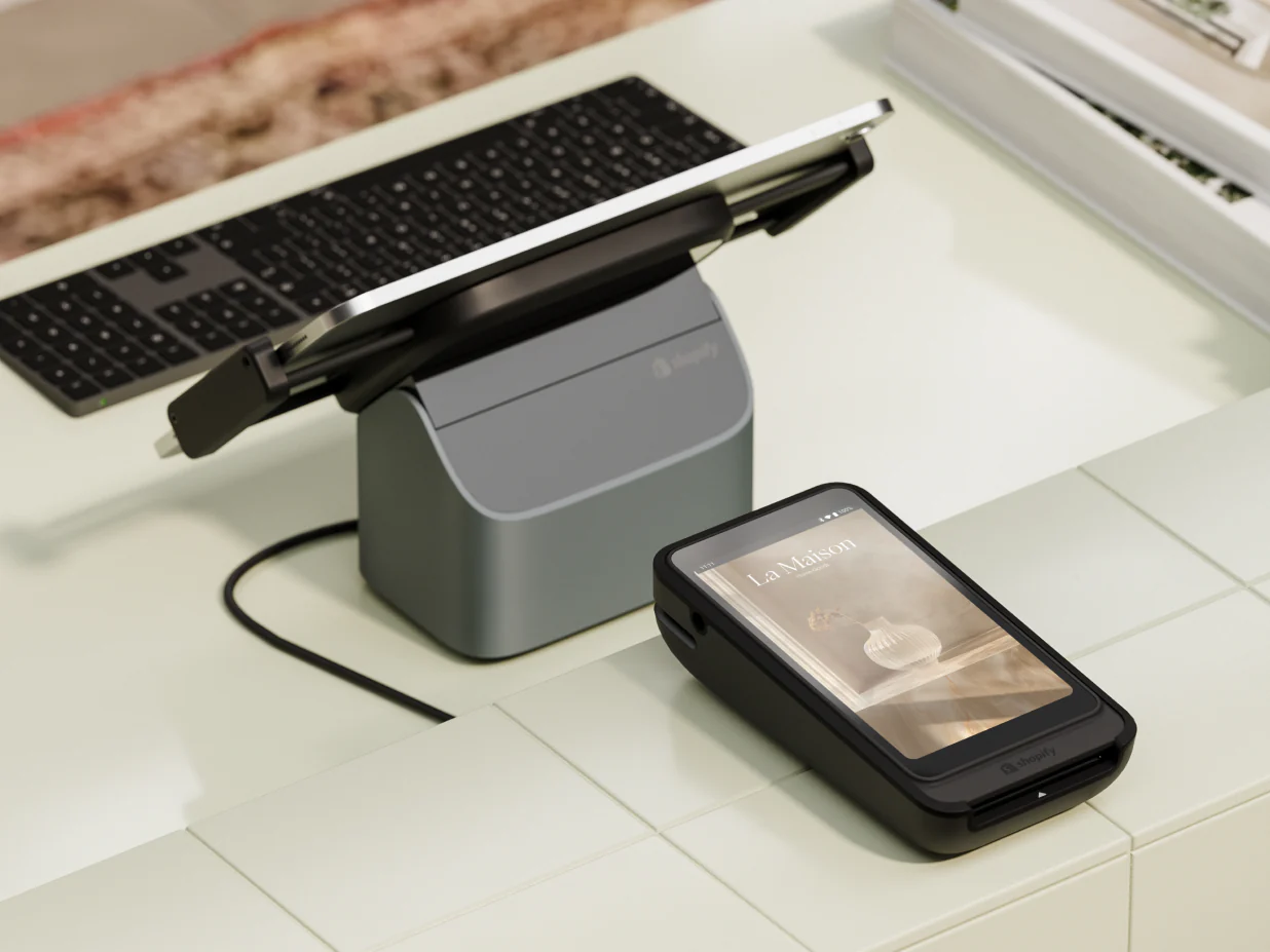 Shopify POS tablet with a customer-facing credit card machine.