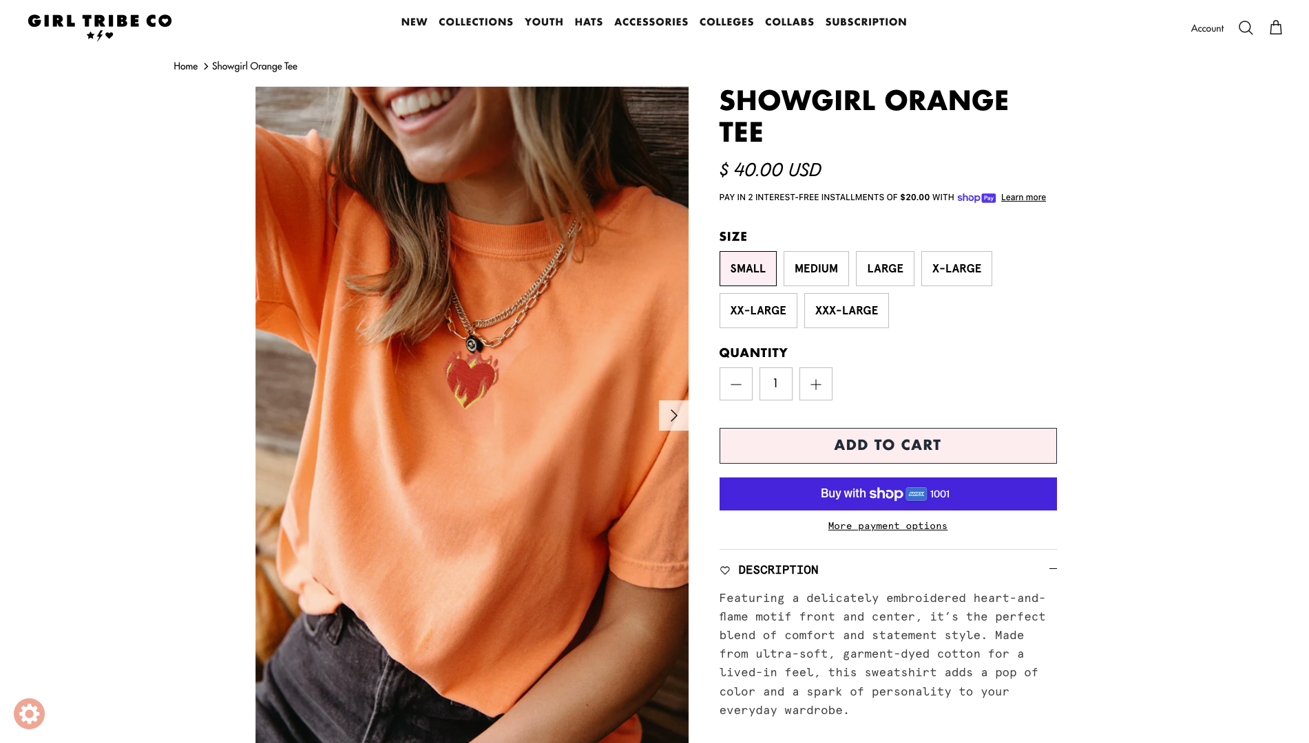 Model wearing relaxed orange t-shirt from Girl Tribe