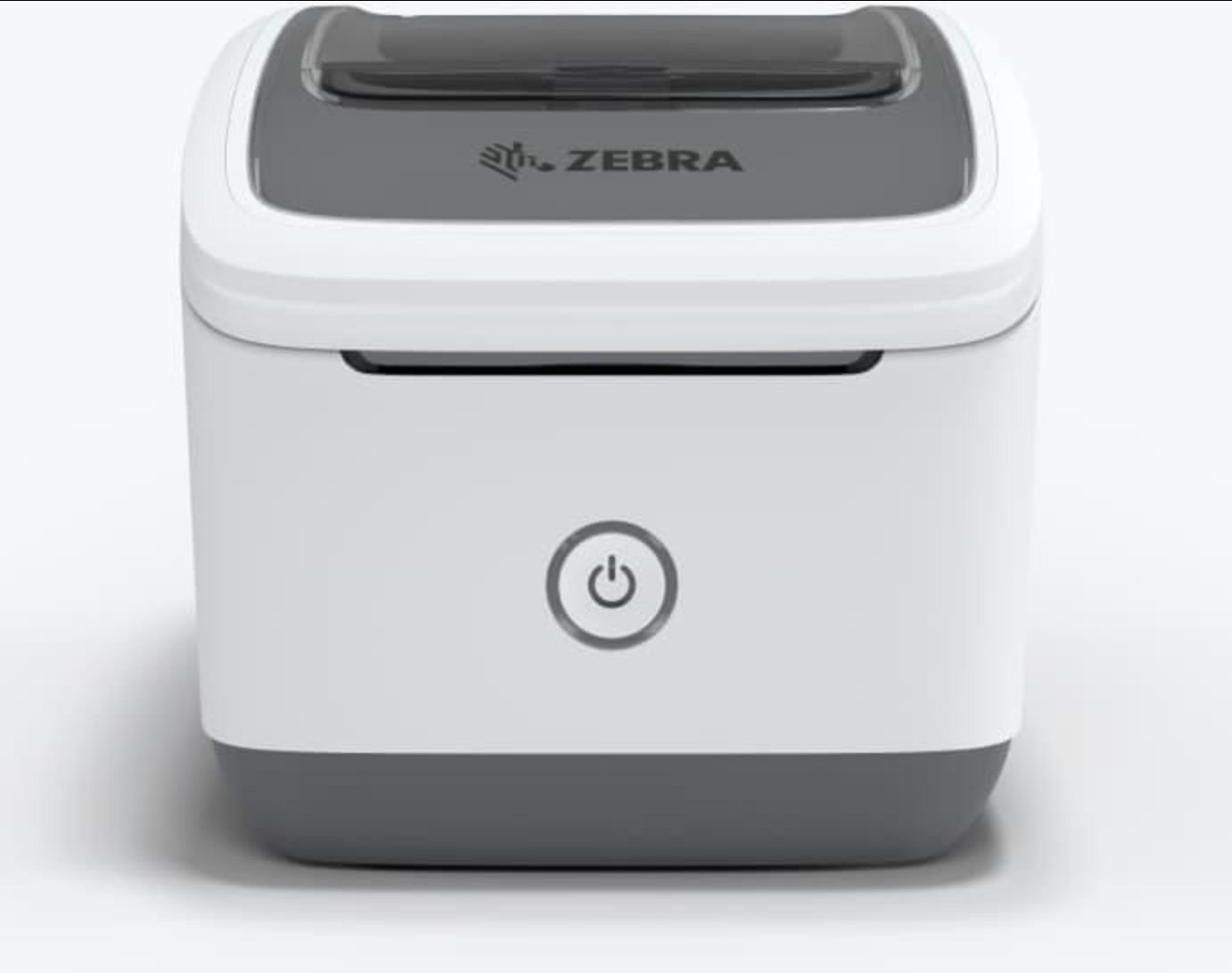 A front view of a white and gray Zebra label printer with a power button.